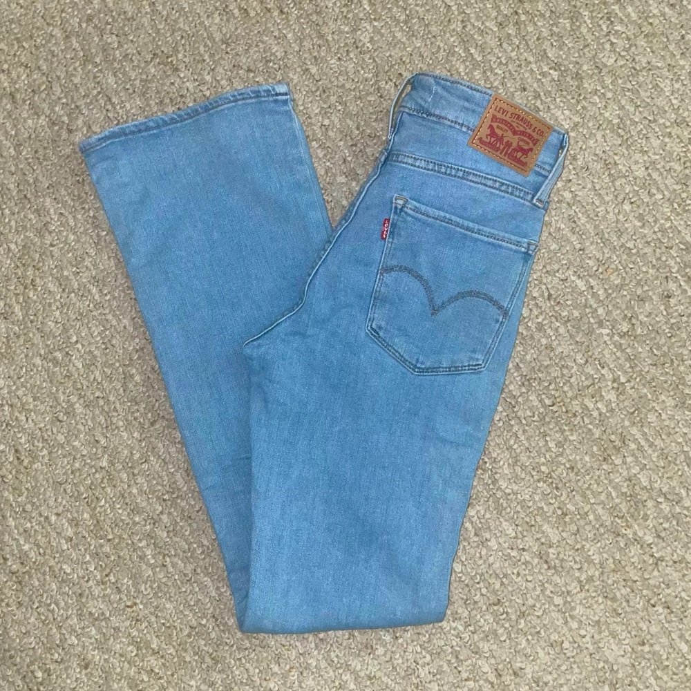Levis 725 High Rise Bootcut Jeans W25